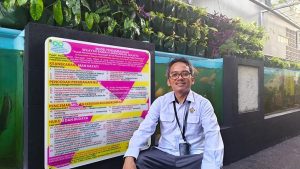 Ketua RT Palugada dalam Balik Rekor MURI Jalan Gang 8 Malaka Jaya Duret Sawit