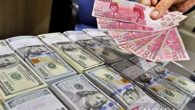 Rupiah Melemah ke Rp17.997 per Dolar AS akibat Ekspektasi Kenaikan Suku Bunga Fed